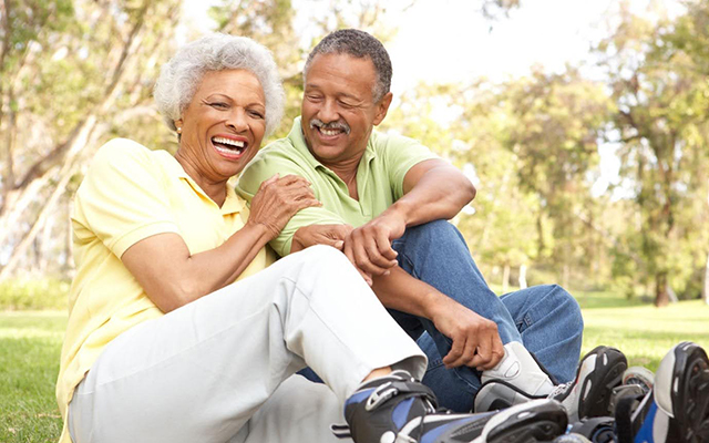 older african american couple on rollerskates